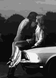 Car Couple GIF - Car Couple Kissing GIFs