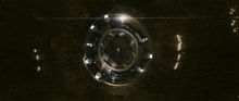 an aerial view of a circular object with a square in the center