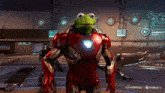 kermit the frog is wearing a red and gold iron man suit