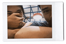a picture of a man and a woman with the letter n visible