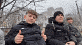 a group of young men giving a thumbs up with pixverse.ai in the upper right corner