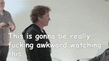 a man in a black hoodie says " this is gonna be really fucking awkward watching "
