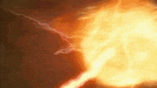 a close up of a lightning strike with a flame in the background