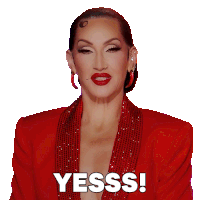 a woman wearing a red jacket says yesss