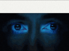 a picture of a person 's eyes with the words jarvis busca " ii lost " en gifs de discord