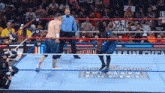 a wrestling ring with a sign that says we are awful