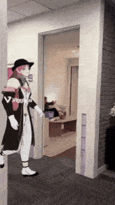 a cartoon character is standing in a hallway with the word viggleai on the wall