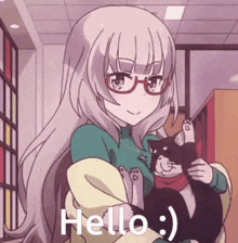 a girl with glasses is holding a cat in her arms and saying hello .