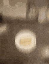 a blurred image of a wall with a circle in the center