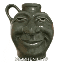 a close up of a frog 's head with its tongue out and the words `` mewhen leyp '' written below it .