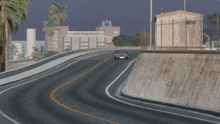 a car is on its side on a road