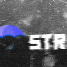 a blurred image of the word star in white