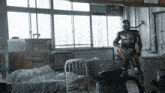 a man in a skeleton costume stands in a room