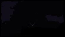 a black background with a white circle with a red arrow in the middle