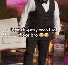 a man in a tuxedo is standing in front of a chair with the caption how slippery was that floor bro on it