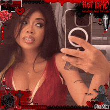 a picture of a woman taking a selfie with the words hot topic everything about the music above her
