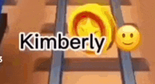 a person 's name is kimberly and there is a smiley face on the tracks .