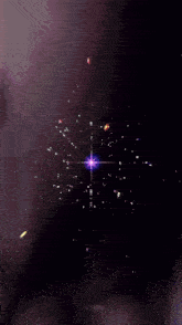 a close up of a woman 's face with a star in the middle of it