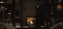 a fireplace in a living room with a scream mask