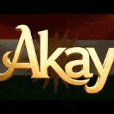 the word akay is written in gold letters