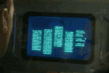 a man is looking at a screen that says ' i 'm a ' on it