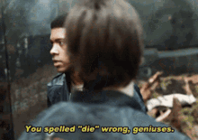 a man in a black jacket says you spelled " die " wrong