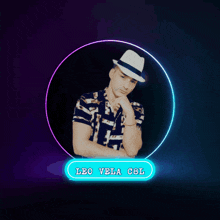 a man in a hat is surrounded by a neon circle with the name leo vela c8l on it