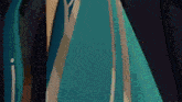 a man in a suit and tie is walking down a blue carpet in a dark room .