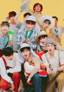 a group of young men are posing for a picture while wearing hats and overalls