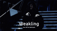 a weakling you will be destroyed message is displayed on a screen