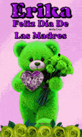 a green teddy bear is holding a purple heart and roses