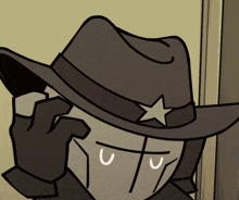a man wearing a cowboy hat with a star on it