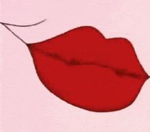 a close up of a woman 's red lips with a smiling face .
