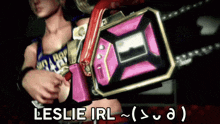 a woman holding a chainsaw with the words leslie irl
