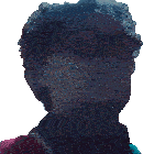 a man with glasses and a beard looks up at the sky