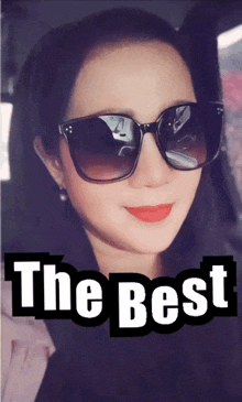 a picture of a woman wearing sunglasses with the words the best above her