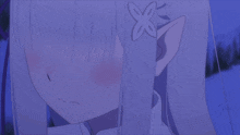 a close up of a girl 's ear with a flower on it
