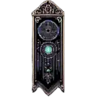 a black and gold item with a green circle in the middle