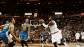 a basketball game is being played with the score at 22