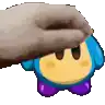 a person is petting a blue and yellow cartoon character with purple feet .