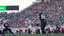 a football player with the number 96 on his back