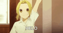 a girl in a white shirt is standing in front of a wall with her arm raised and says hello .