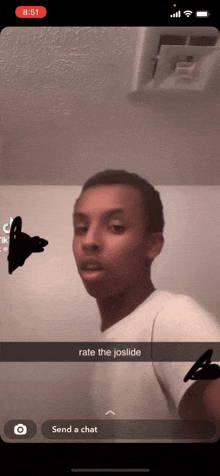 a screenshot of a man 's face with the words rate the joslide at the bottom