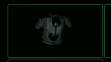 a person wearing a t-shirt with a picture of elvis presley