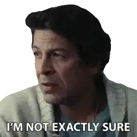 a man says i 'm not exactly sure while wearing a sweater