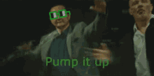 a man in a suit is dancing with the words pump it up in green letters