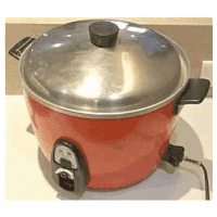 a red rice cooker with a stainless steel lid is sitting on a white counter .