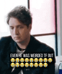 a man in a suit is sitting in front of a window with a caption that says even he was weirded tf out