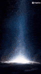 a picture of a light coming out of a dark sky with the caption capcut