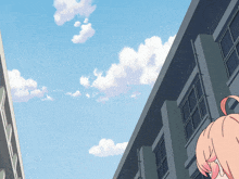 a girl with pink hair stands in front of a building